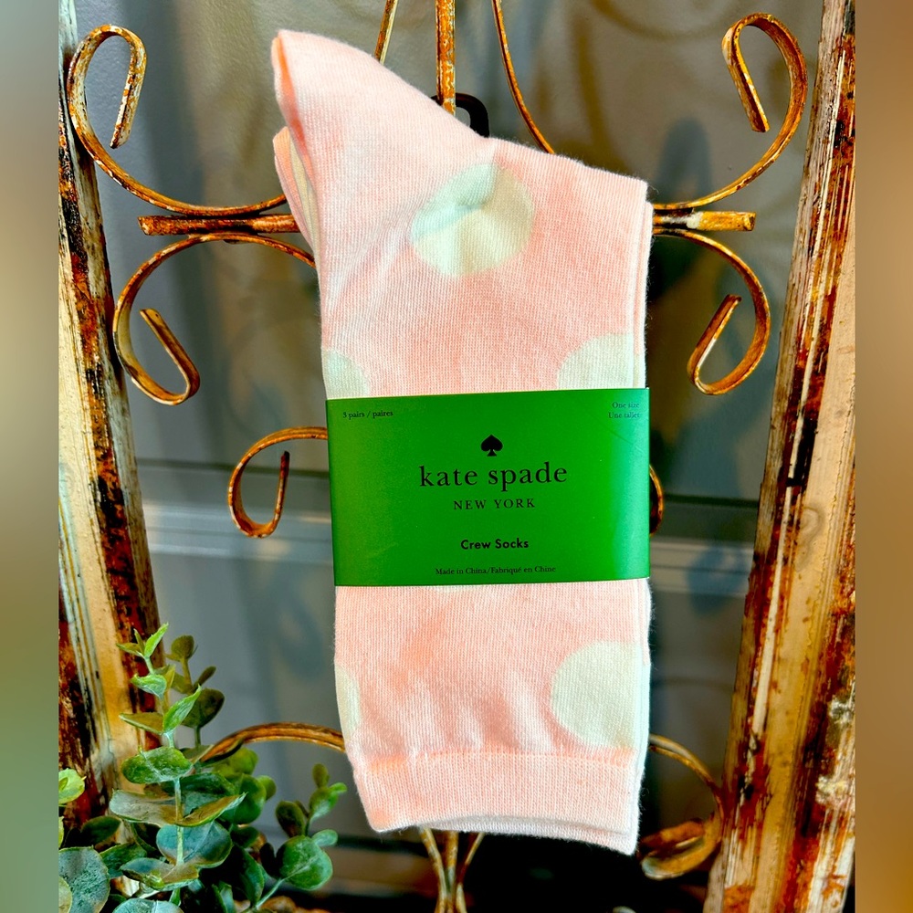 Kate Spade New York 3-pair set of pink and white polka dot crew socks.